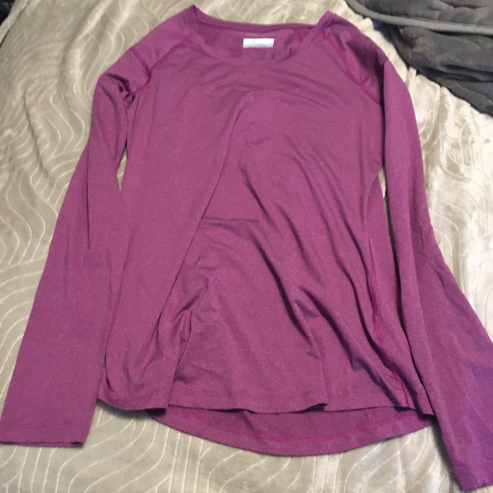 Woman’s purple Columbia shirt